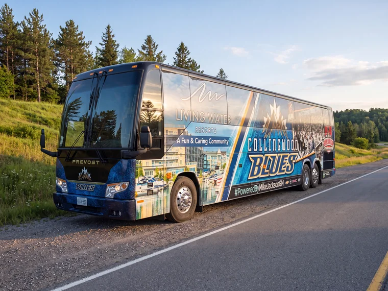 The team coach travelling an Ontario highway at golden hour